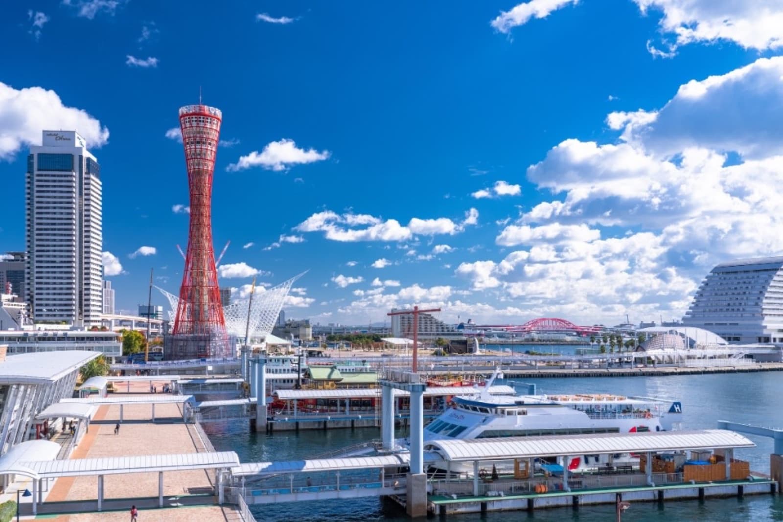 Kobe Port Tower and Meriken Park waterfront on a sunny day