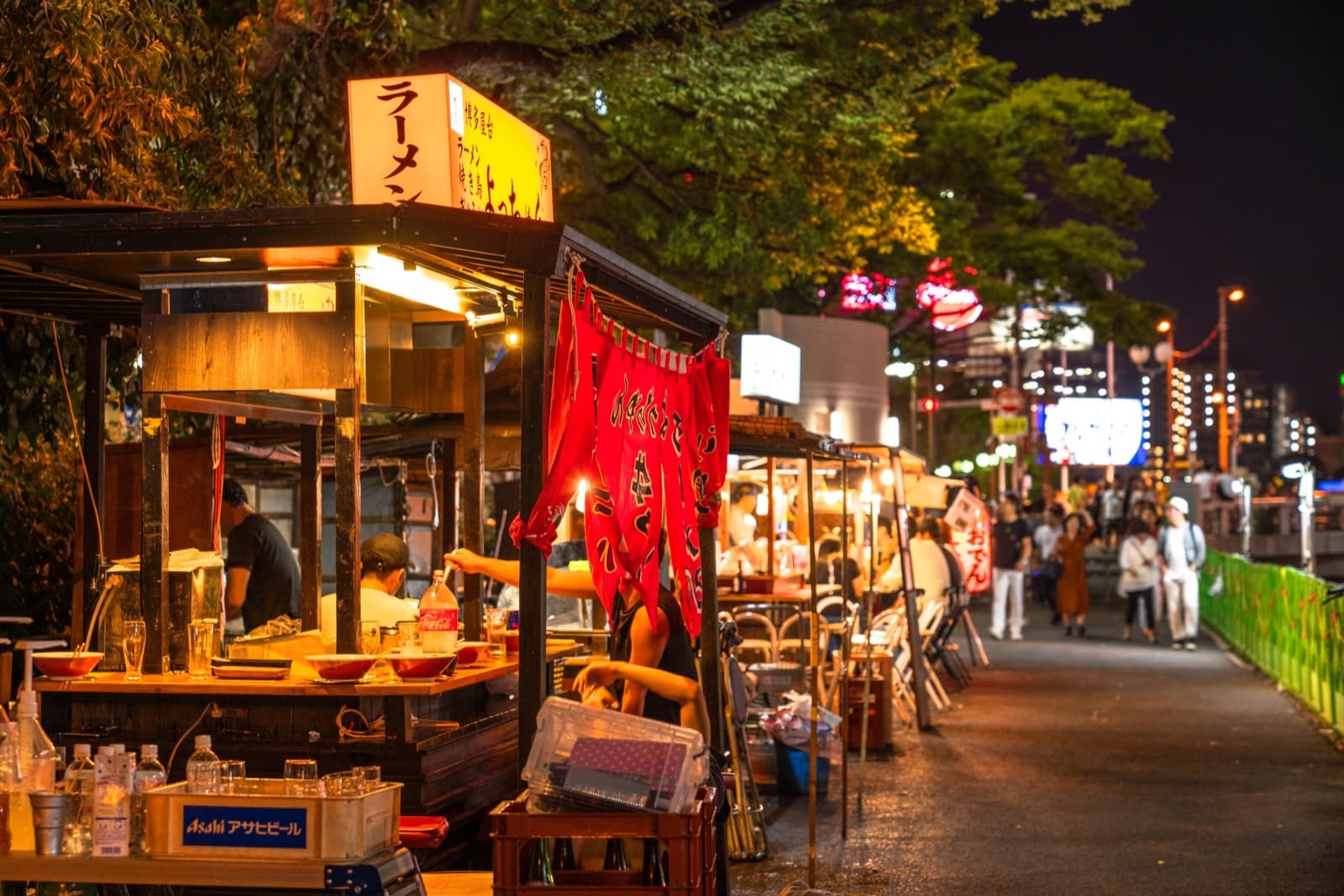 Nakasu riverside yatai food stalls lit up at night in Fukuoka, northern Kyushu